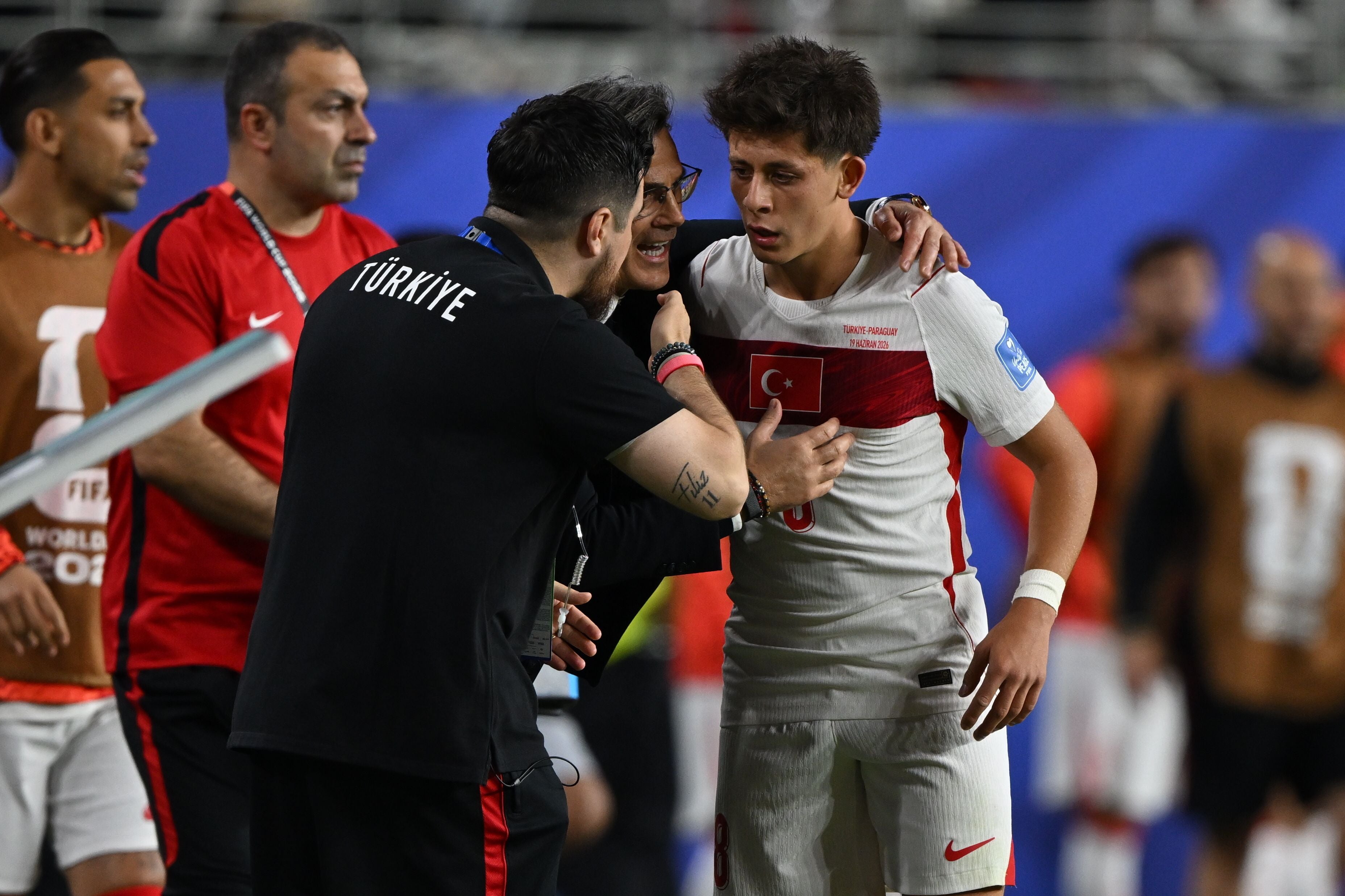 SANTA CLARA, UNITED STATES - JUNE 19: Head coach Vincenzo Montella (C) talks to his player Arda Guler (R) during the 2026 FIFA World Cup First Stage Group D match between Turkiye and Paraguay at the San Francisco Bay Area Stadium (Leviâs Stadium) in Santa Clara, California, United States on June 19, 2026. (Photo by Tayfun Coskun/Anadolu via Getty Images)
