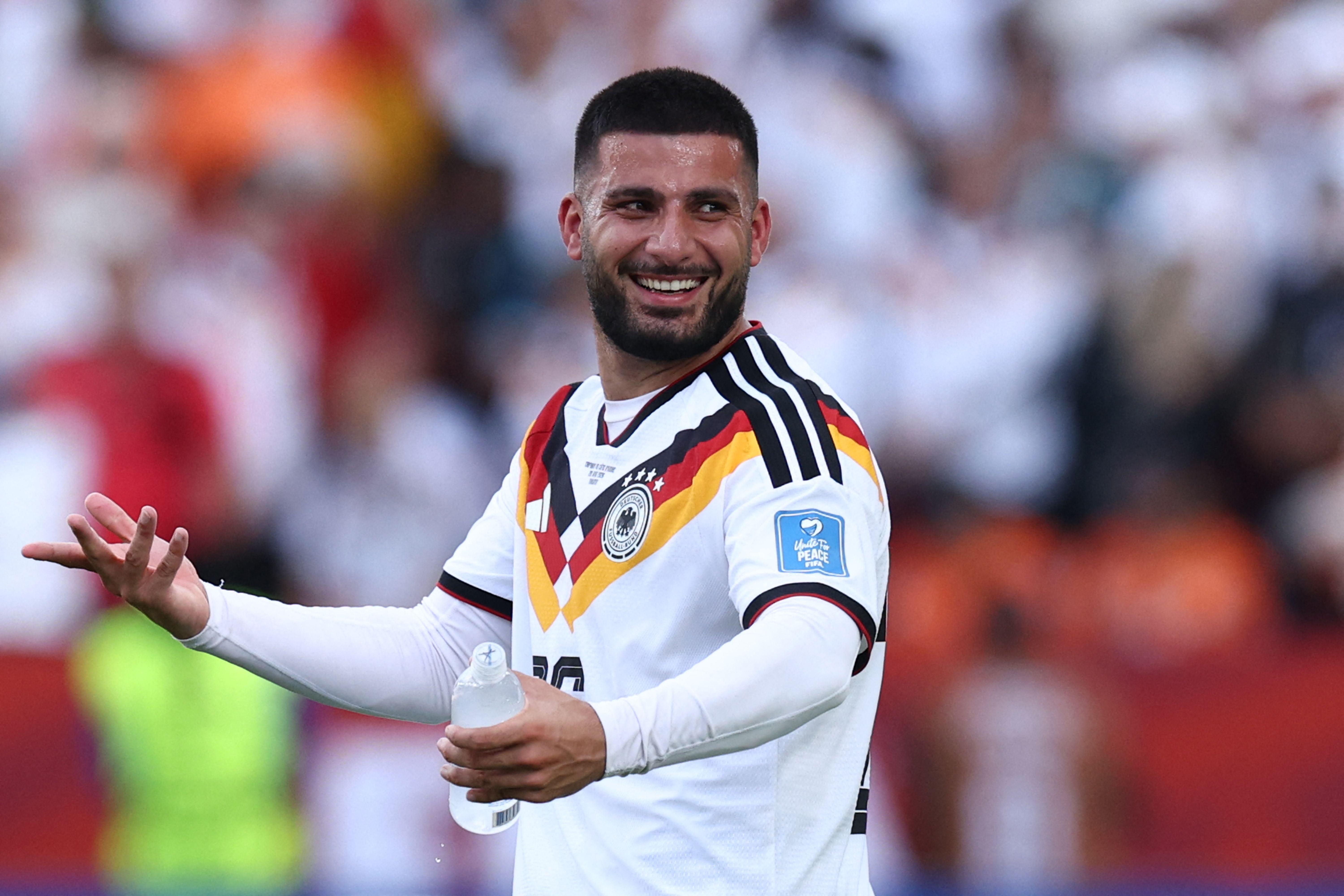 TOPSHOT - Germany's forward #26 Deniz Undav celebrates his team's victory at the end of the 2026 World Cup Group E football match between Germany and Ivory Coast at the Toronto Stadium in Toronto on June 20, 2026. (Photo by Cole Burston / AFP)