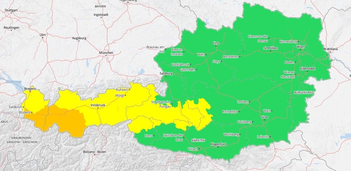 Gewitter-Warnkarte für Österreich mit gelb und orange markierten Regionen.