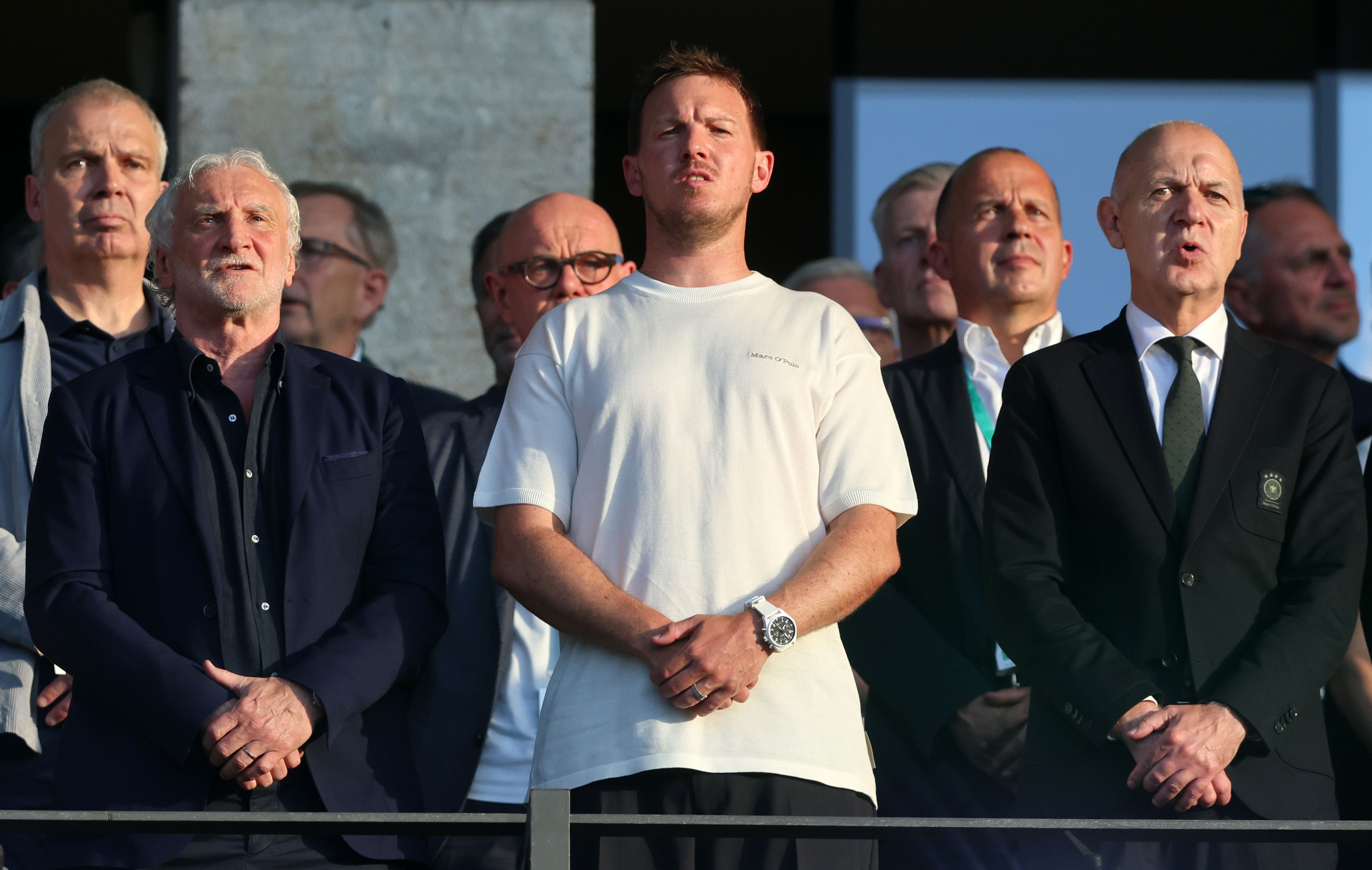 BERLIN, GERMANY - MAY 23: Julian Nagelsmann, Head Coach of the Germany national team, Bernd Neuendorf, President of the German Football Association and Sports director Rudi Voeller of 'Germany 'look on prior the DFB Cup Final 2026 match between FC Bayern München and VfB Stuttgart at Olympiastadion on May 23, 2026 in Berlin, Germany. (Photo by Stefan Matzke - sampics/Getty Images)