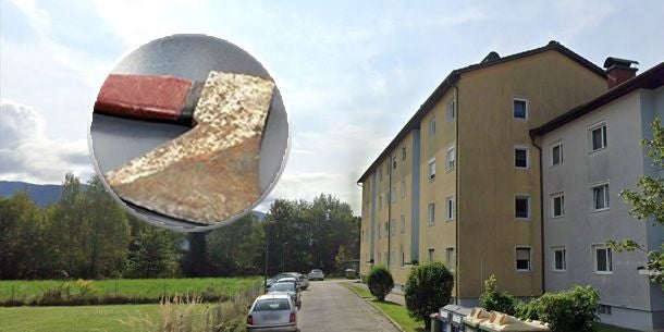 Mehrstöckiges Wohnhaus mit geparkten Autos und eingezoomtem Bildausschnitt eines Messers.