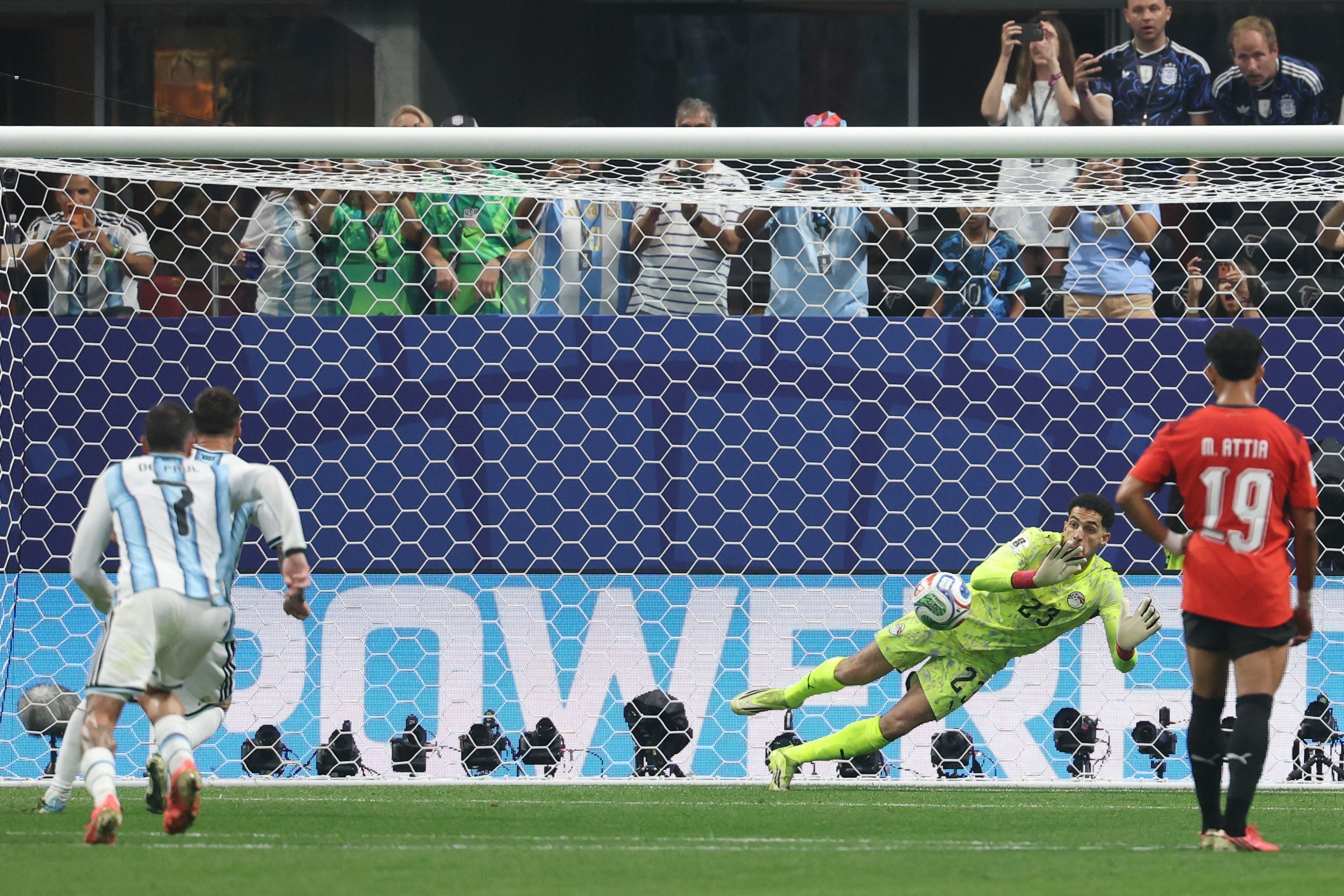 Egypt's goalkeeper #23 Mostafa Shoubir stops a penalty shoot by Argentina's forward #10 Lionel Messi during the 2026 World Cup round of 16 football match between Argentina and Egypt at Atlanta Stadium in Atlanta on July 7, 2026. (Photo by Odd ANDERSEN / AFP)