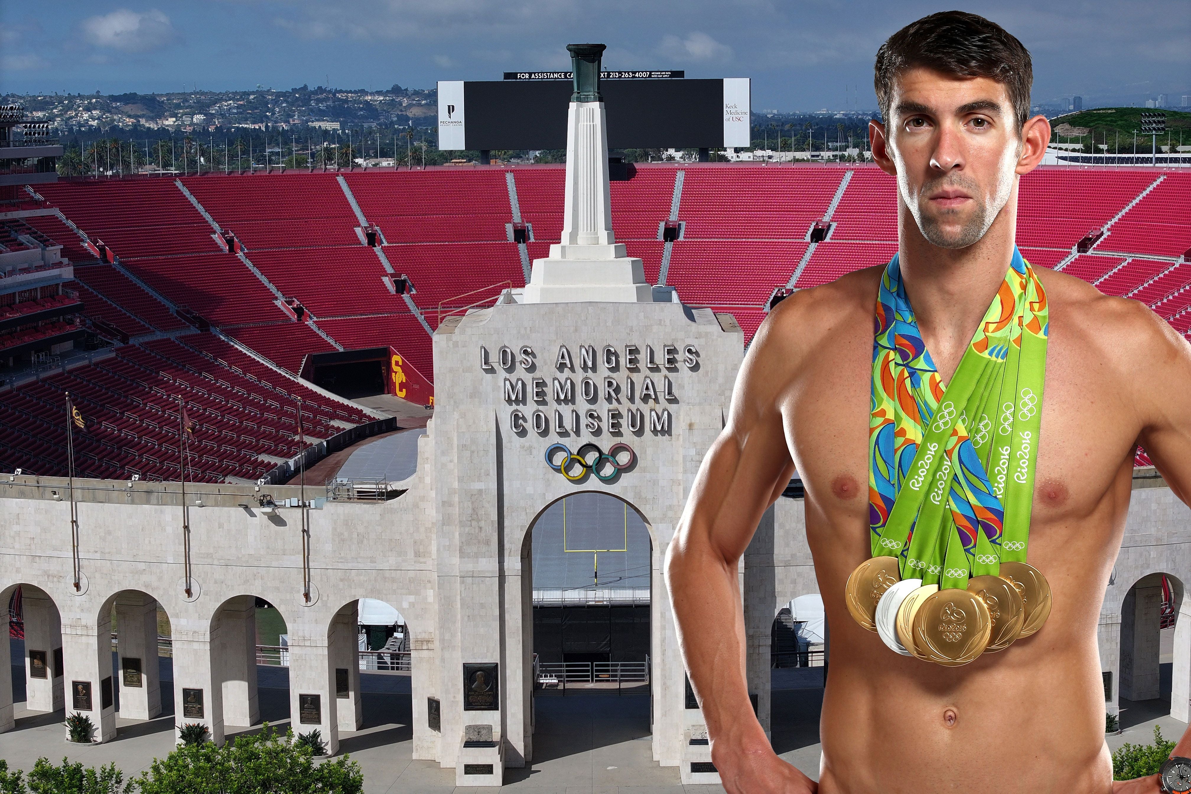 Ein Schwimmer mit vielen olympischen Medaillen steht vor dem Los Angeles Memorial Coliseum.