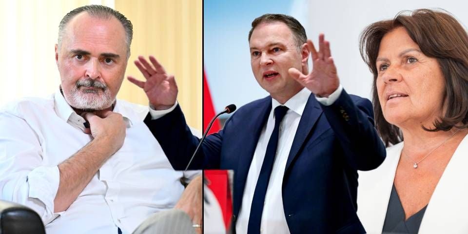 Drei Personen, zwei Männer und eine Frau, bei einer politischen Diskussion oder Veranstaltung.