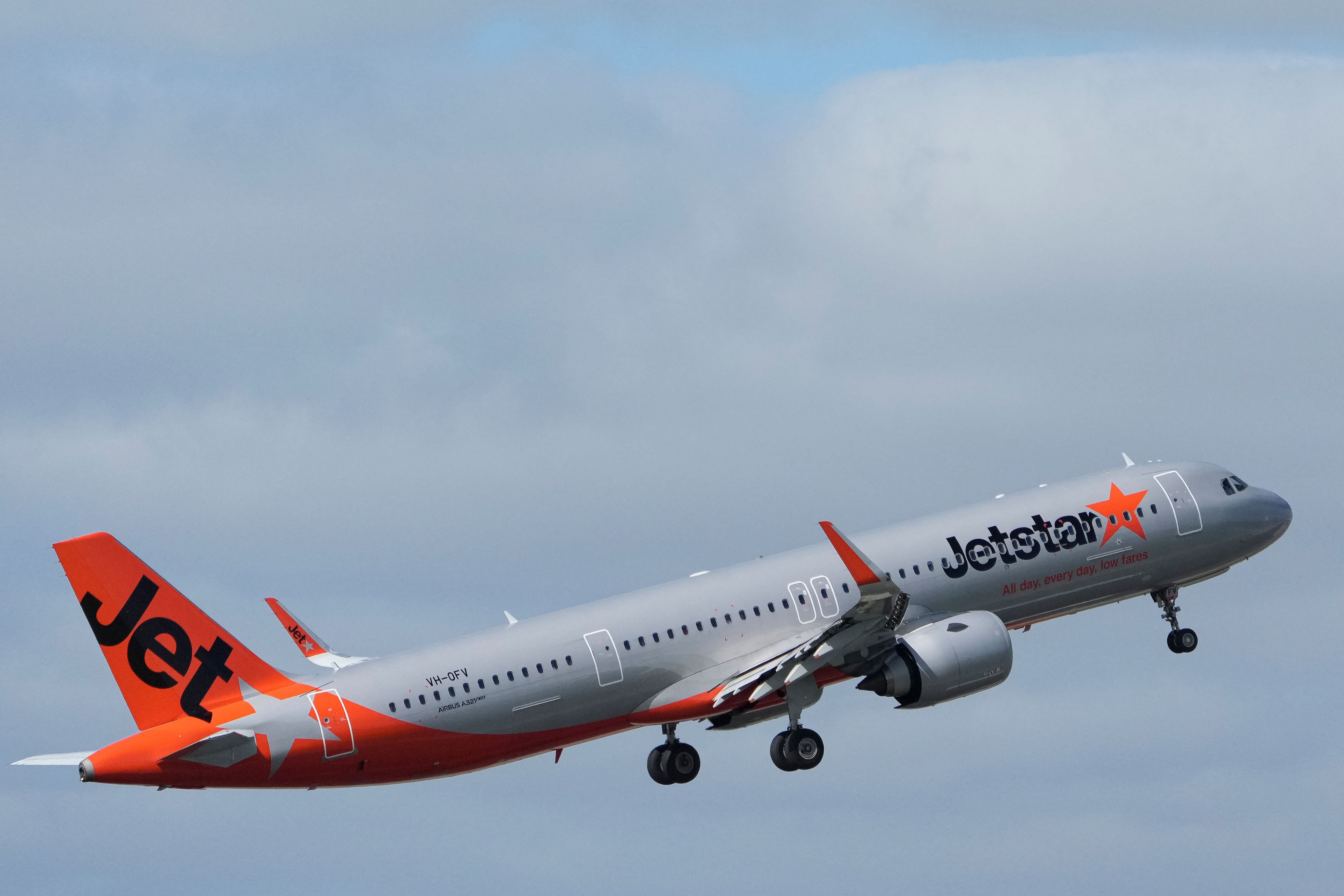 MELBOURNE, AUSTRALIA - APRIL 18: A VH-OFV Jetstar Airways Airbus A321-251NX takes off from Melbourne Airport on April 18, 2026 in Melbourne, Australia. The surge in Australian fuel prices follows disruptions to global oil supply chains stemming from the ongoing Iran conflict, driving jet fuel costs to multi-year highs and pressuring Australian carriers to review route pricing and capacity. (Photo by Asanka Ratnayake/Getty Images)