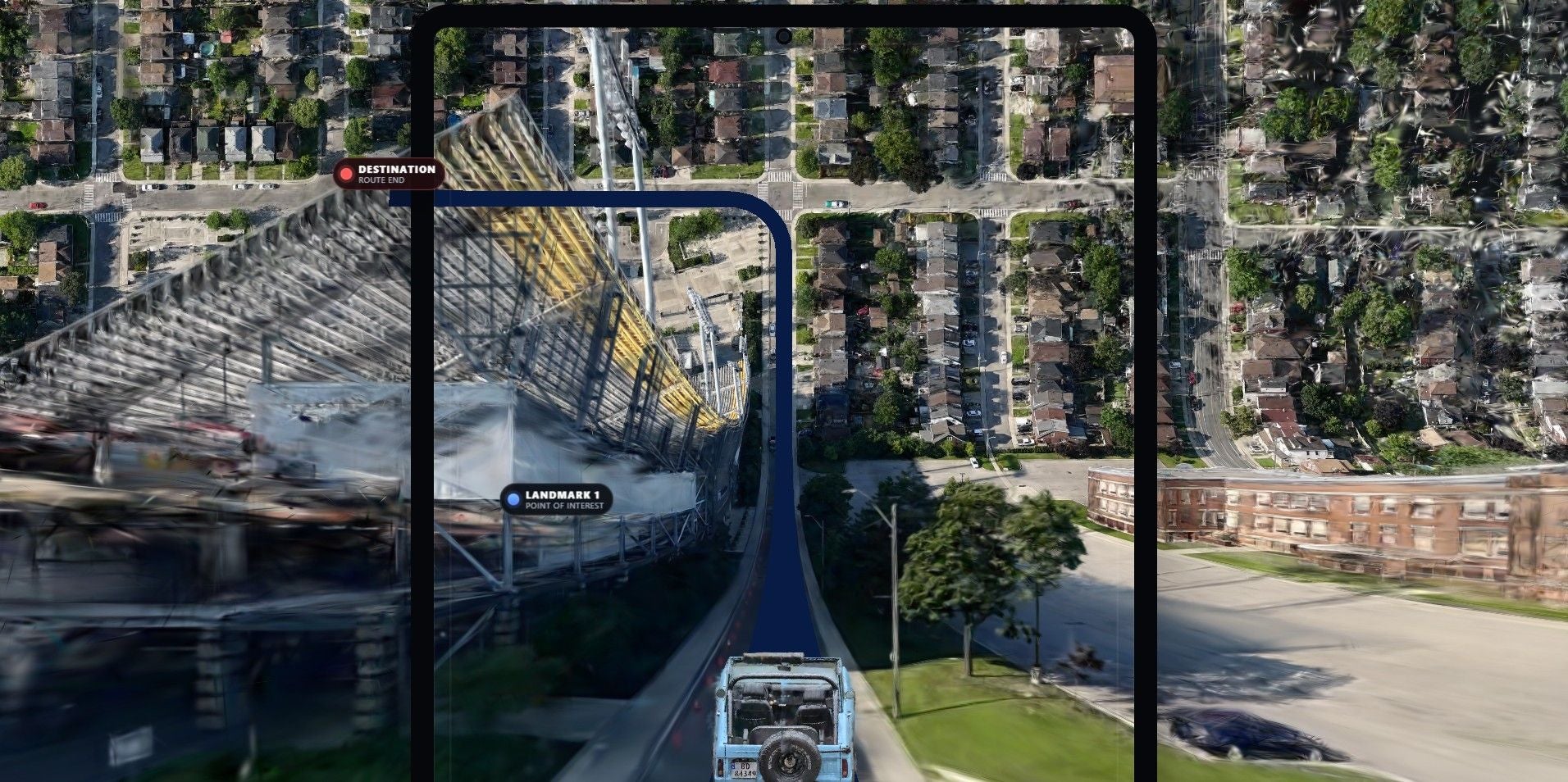 Eine virtuelle 3D-Navigation zeigt eine Route mit einem Jeep durch eine Stadt aus der Vogelperspektive.