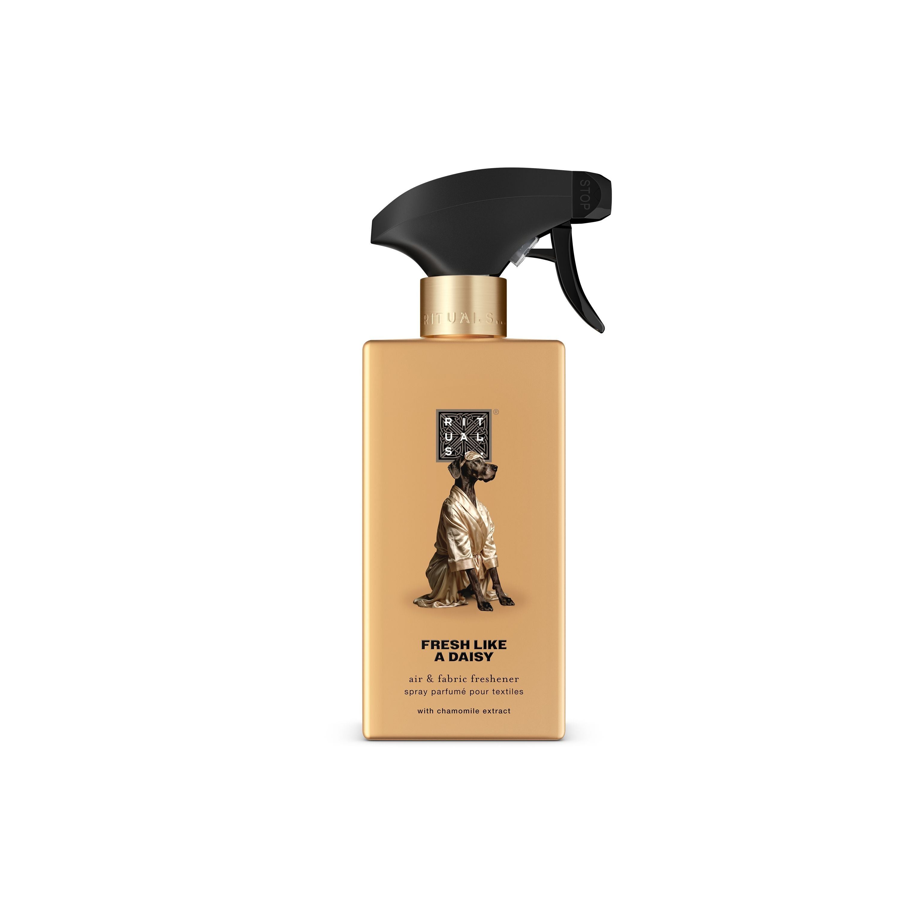Sprühflasche von Rituals mit beigem Etikett und Hund in Bademantel illustriert.