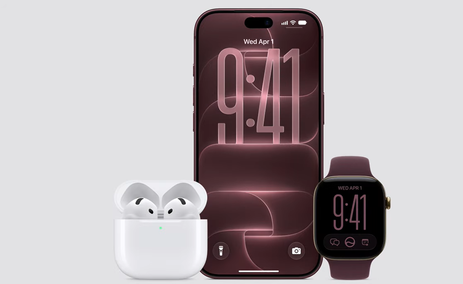 Apple iPhone, AirPods und Apple Watch in lila Tönen auf hellem Hintergrund.