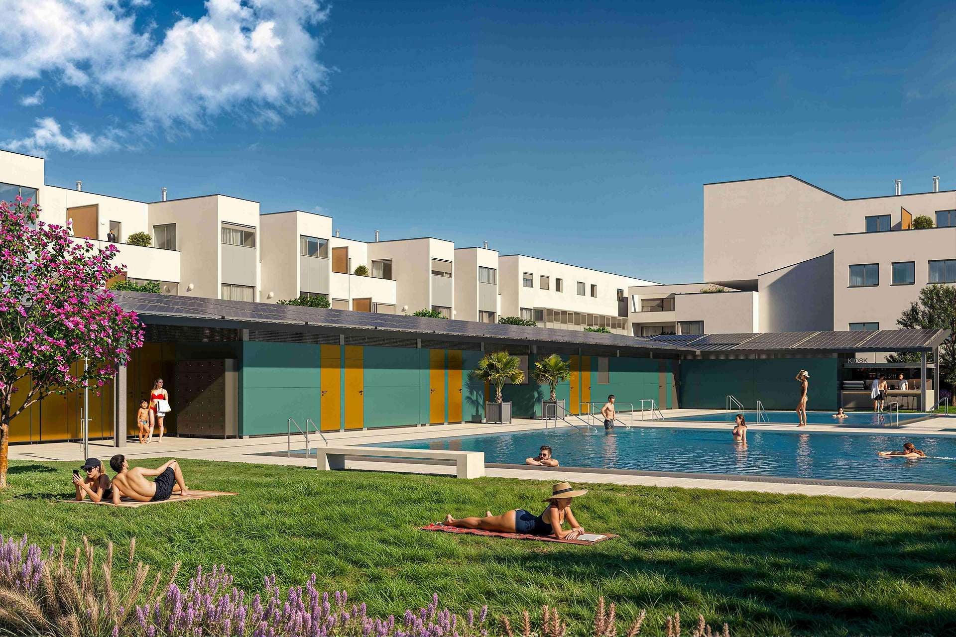 Menschen entspannen und baden im modernen Familienschwimmbad mit Liegewiese in Stammersdorf.
