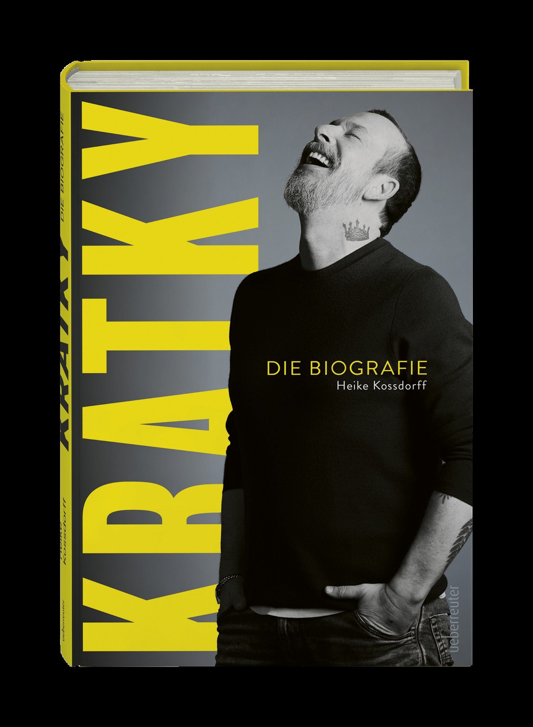 Buchcover von "Kratky – Die Biografie" mit lachendem Mann auf grauem Hintergrund.
