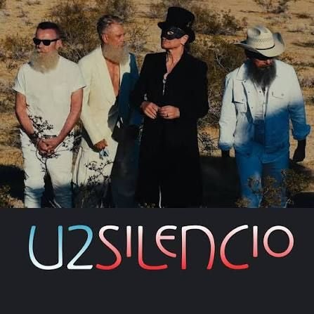 Vier Männer stehen in einer Wüstenlandschaft, unten steht „U2 Silencio“.