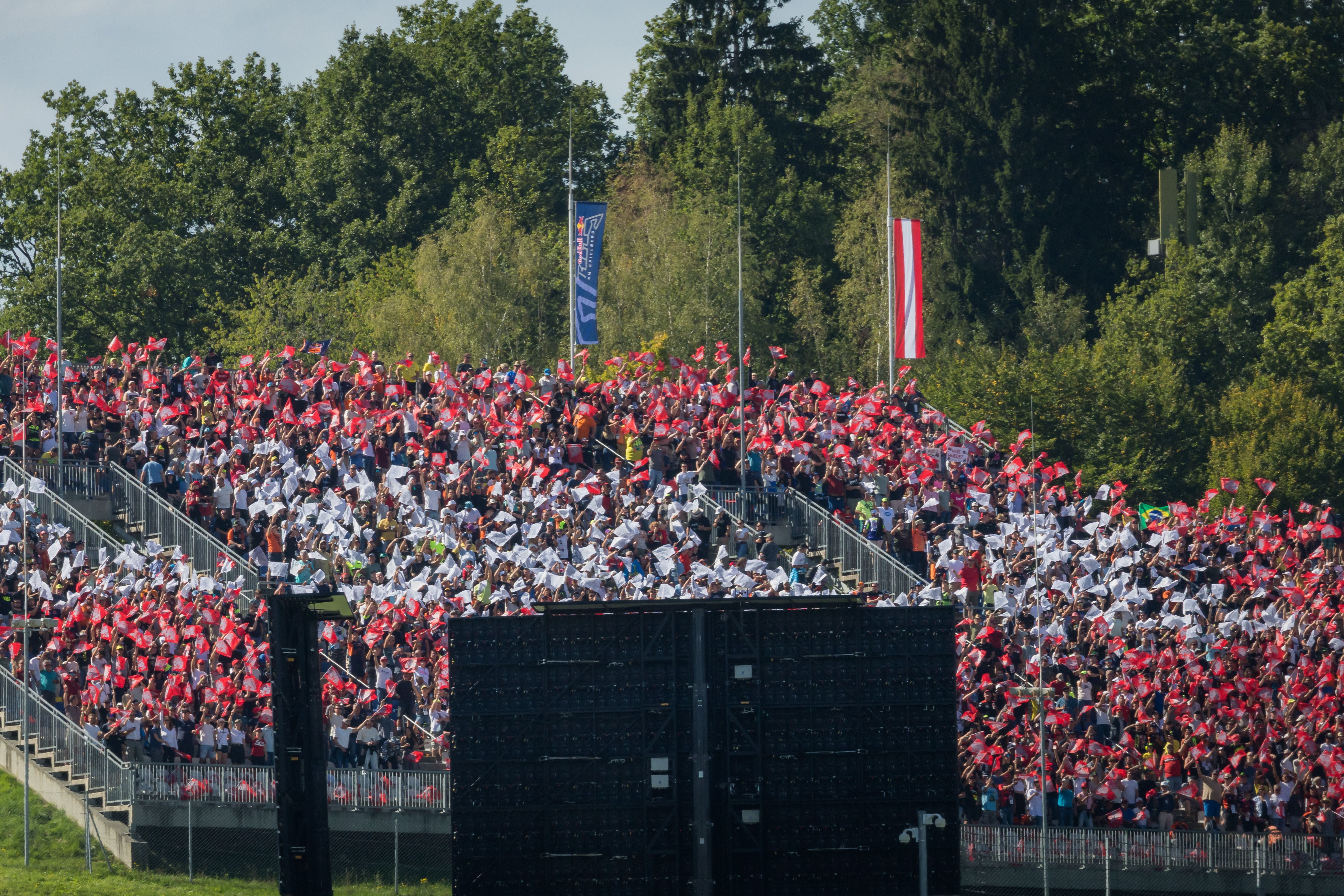 SPIELBERG,AUSTRIA,20.SEP.26 - MOTORSPORTS - MotoGP, Grand Prix of Austria, Red Bull Ring. Image shows the Red Bull grandstand with flags. Photo: GEPA pictures/ Matthias Trinkl