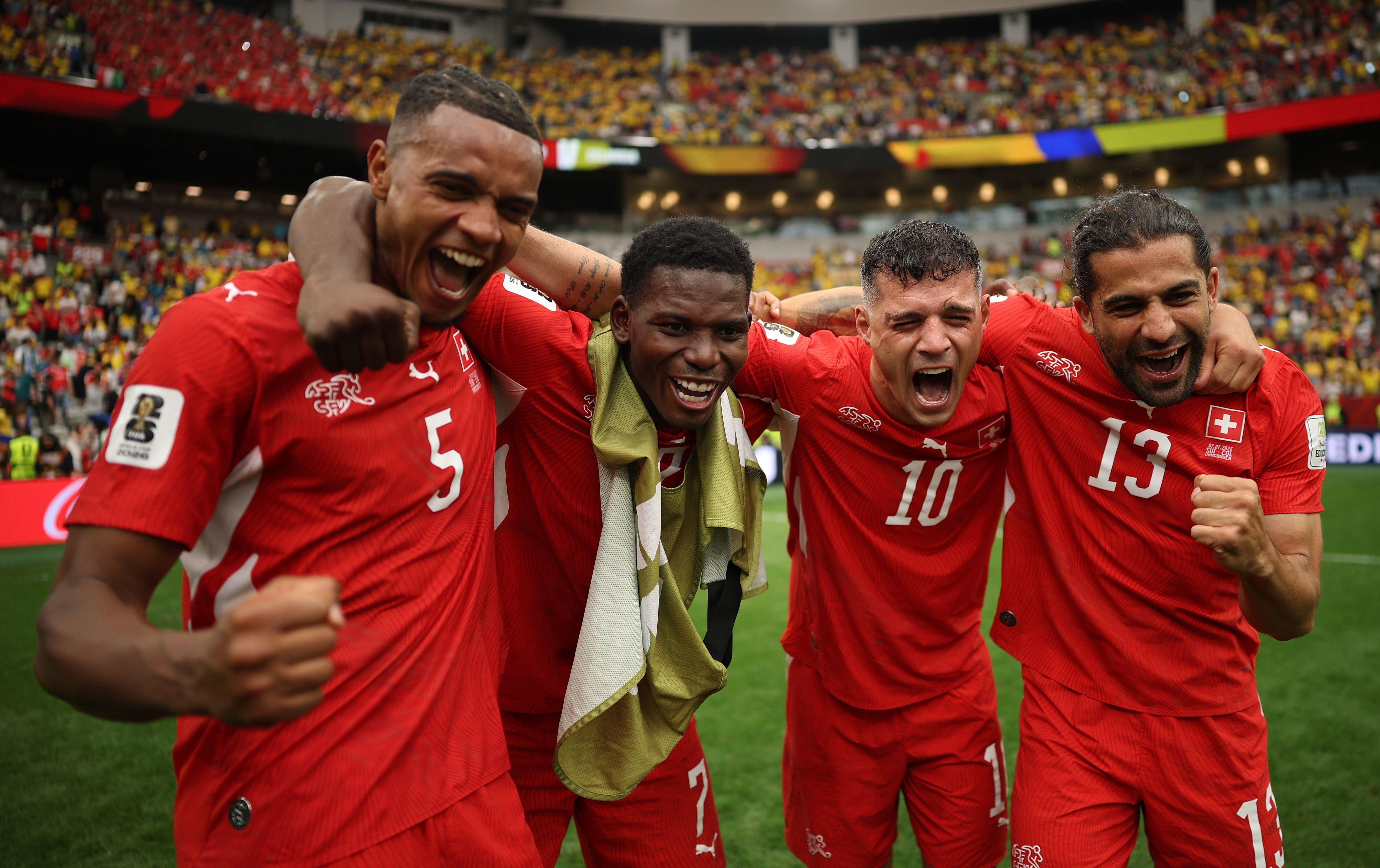 VANCOUVER, CANADA - JULY 07: Manuel Akanji #5, Breel Embolo #7, Granit Xhaka #10 and Ricardo Rodriguez #13 of Switzerland celebrate after the penalty shootout victory during the FIFA World Cup 2026 Round of 16 match between Switzerland and Colombia at BC Place Vancouver on July 07, 2026 in Vancouver, British Columbia, Canada. (Photo by Jared C. Tilton - FIFA/FIFA via Getty Images)
