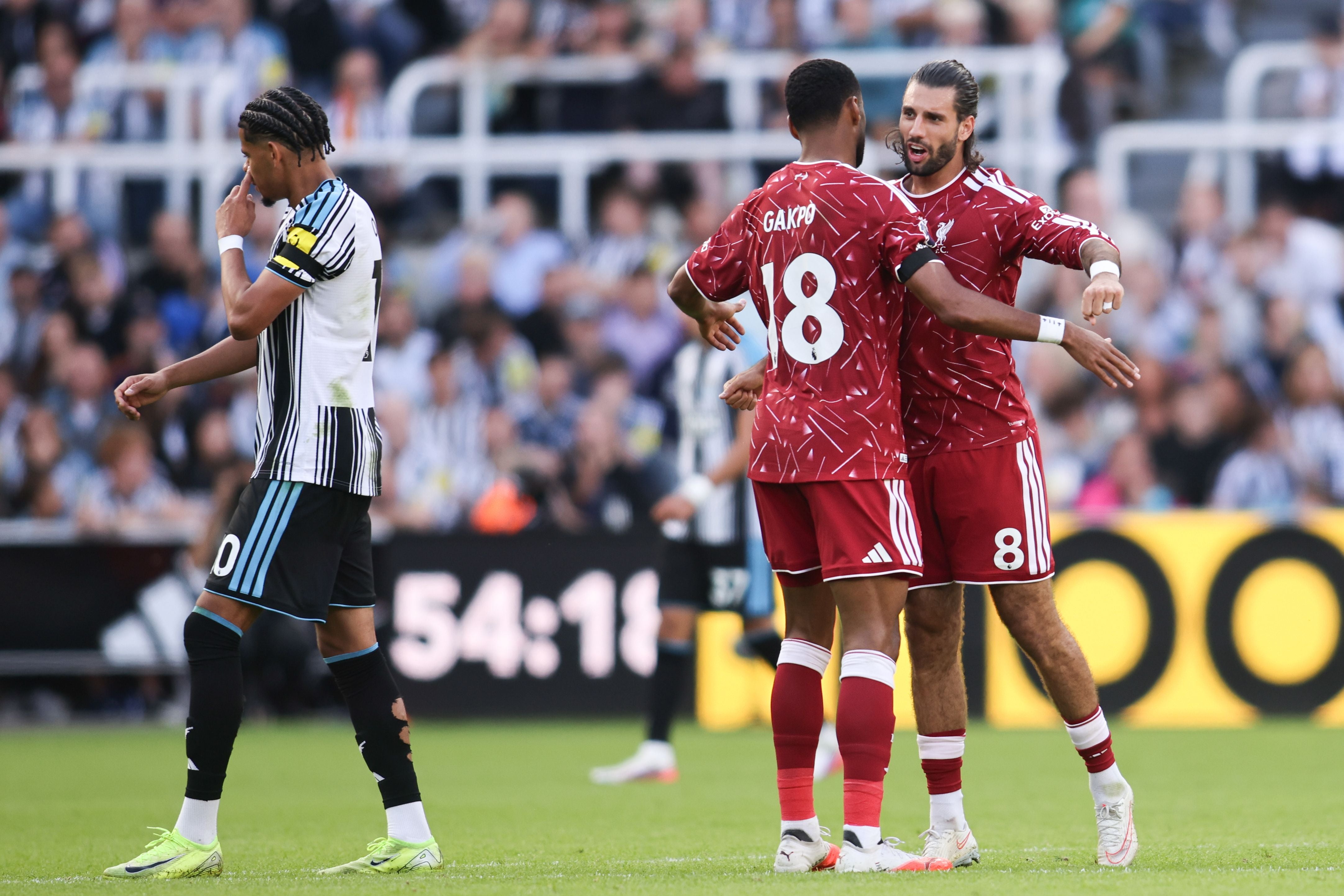 Dominik Szoboszlai of Liverpool embraces Cody Gakpo of Liverpool following his goal during the Premier League match between Newcastle United and Liverpool at St. James's Park in Newcastle, on August 23, 2026. (Photo by Michael Driver/MI News/NurPhoto via Getty Images)