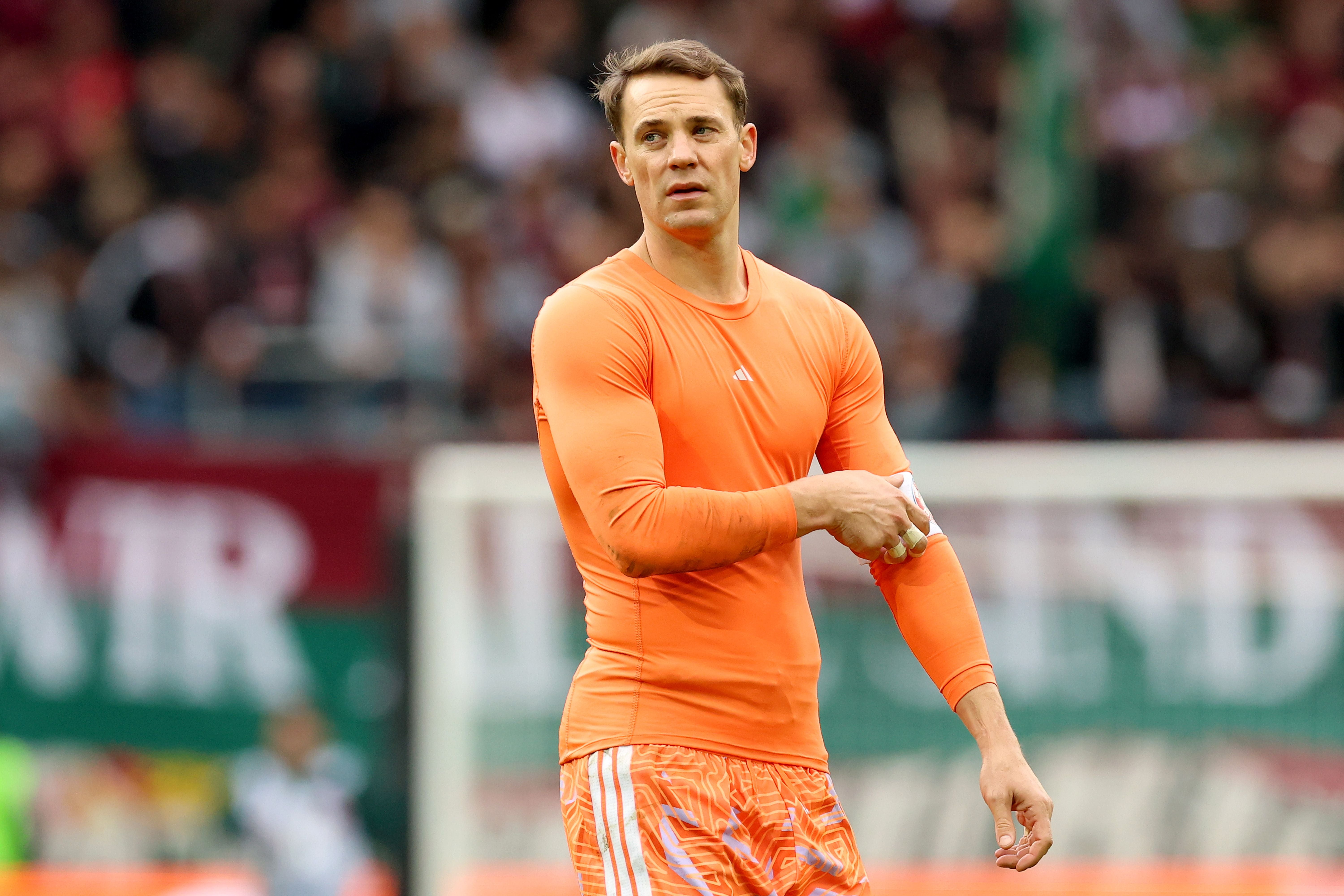 AUGSBURG, GERMANY - OCTOBER 10: Manuel Neuer of FC Bayern Munich looks on after the Bundesliga 2026/27 match between FC Augsburg and FC Bayern München at WWK Arena on October 10, 2026 in Augsburg, Germany. (Photo by Alexander Hassenstein/Getty Images)