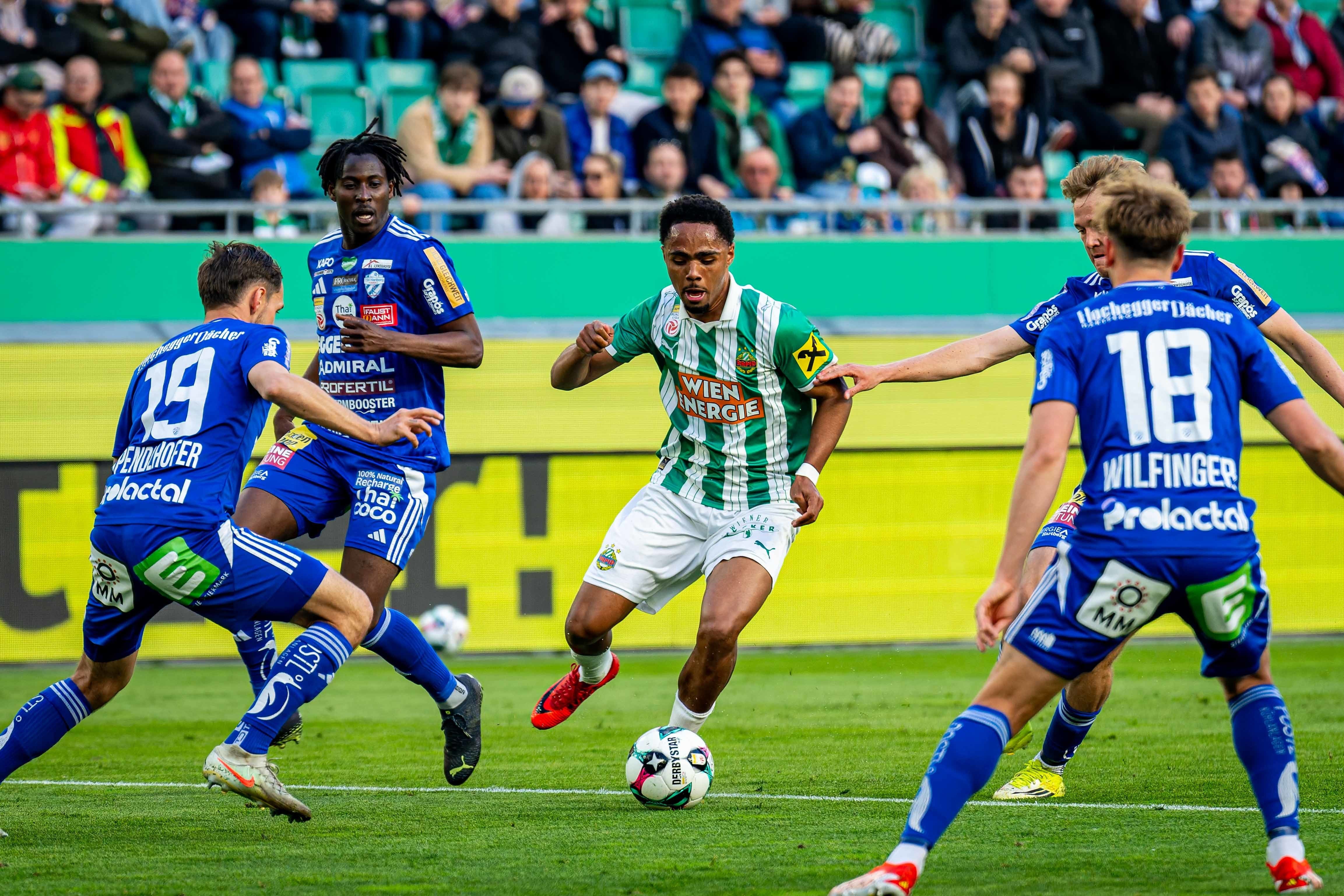 uVIENNA,AUSTRIA,22.APR.26 - SOCCER - ADMIRAL Bundesliga, championship group, SK Rapid Wien vs TSV Hartberg. Image shows Lukas Spendlhofer (Hartberg), Petter Nosa Dahl (Rapid) and Fabian Wilfinger (Hartberg). Photo: GEPA pictures/ Kevin Hackner