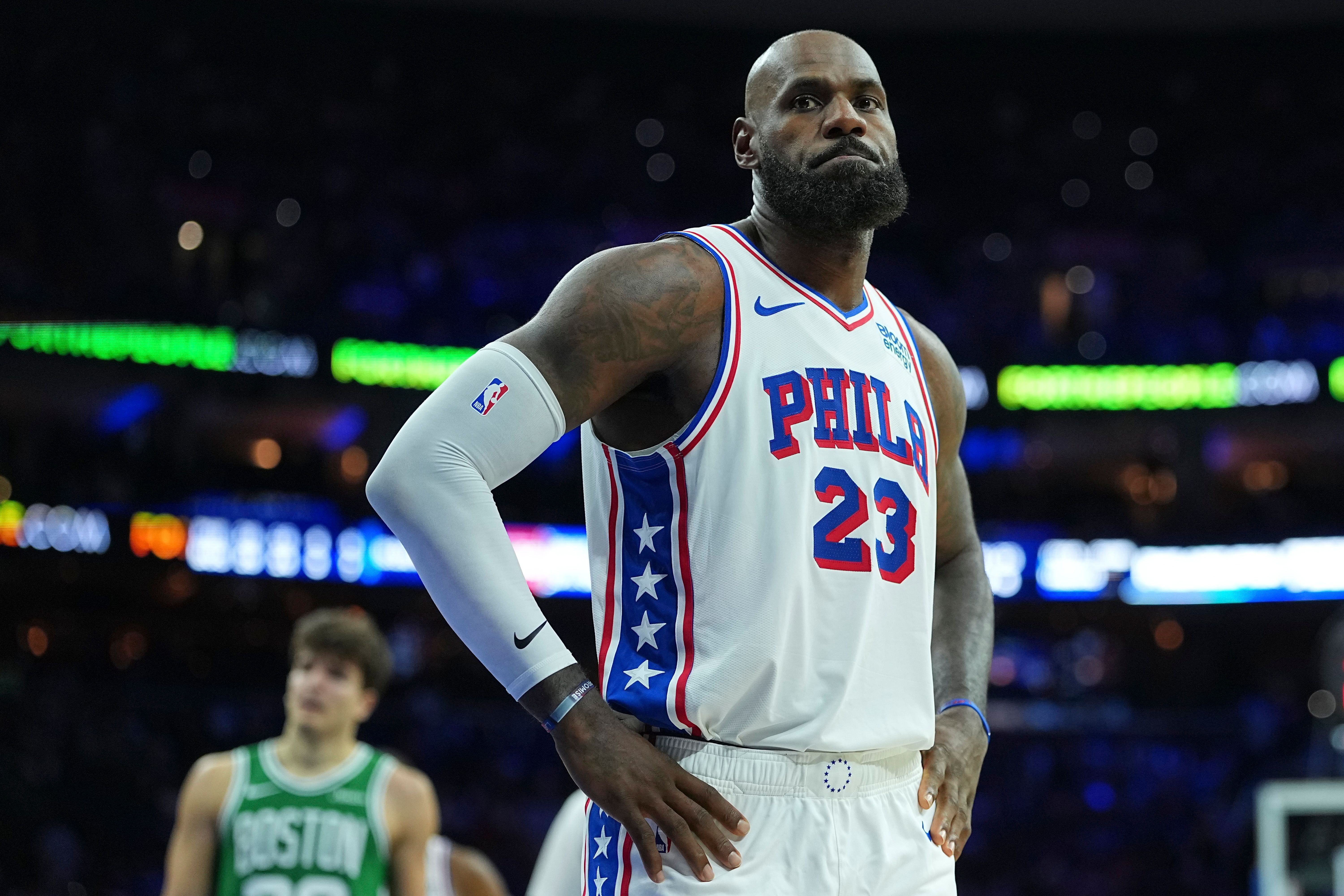 PHILADELPHIA, PENNSYLVANIA - OCTOBER 16: LeBron James #23 of the Philadelphia 76ers looks on against the Boston Celtics during the preseason game at Xfinity Mobile Arena on October 16, 2026 in Philadelphia, Pennsylvania. NOTE TO USER: User expressly acknowledges and agrees that, by downloading and or using this photograph, User is consenting to the terms and conditions of the Getty Images License Agreement. (Photo by Mitchell Leff/Getty Images)