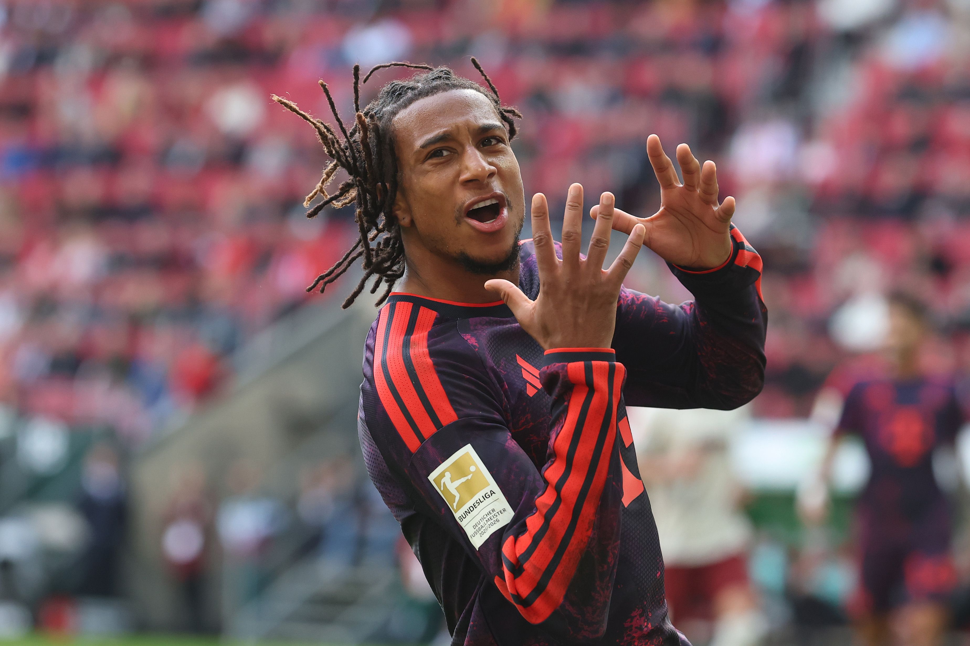 AUGSBURG, GERMANY - OCTOBER 10: Michael Olise of FC Bayern Munich reacts during the Bundesliga 2026/27 match between FC Augsburg and FC Bayern München at WWK Arena on October 10, 2026 in Augsburg, Germany. (Photo by Alexander Hassenstein/Getty Images)