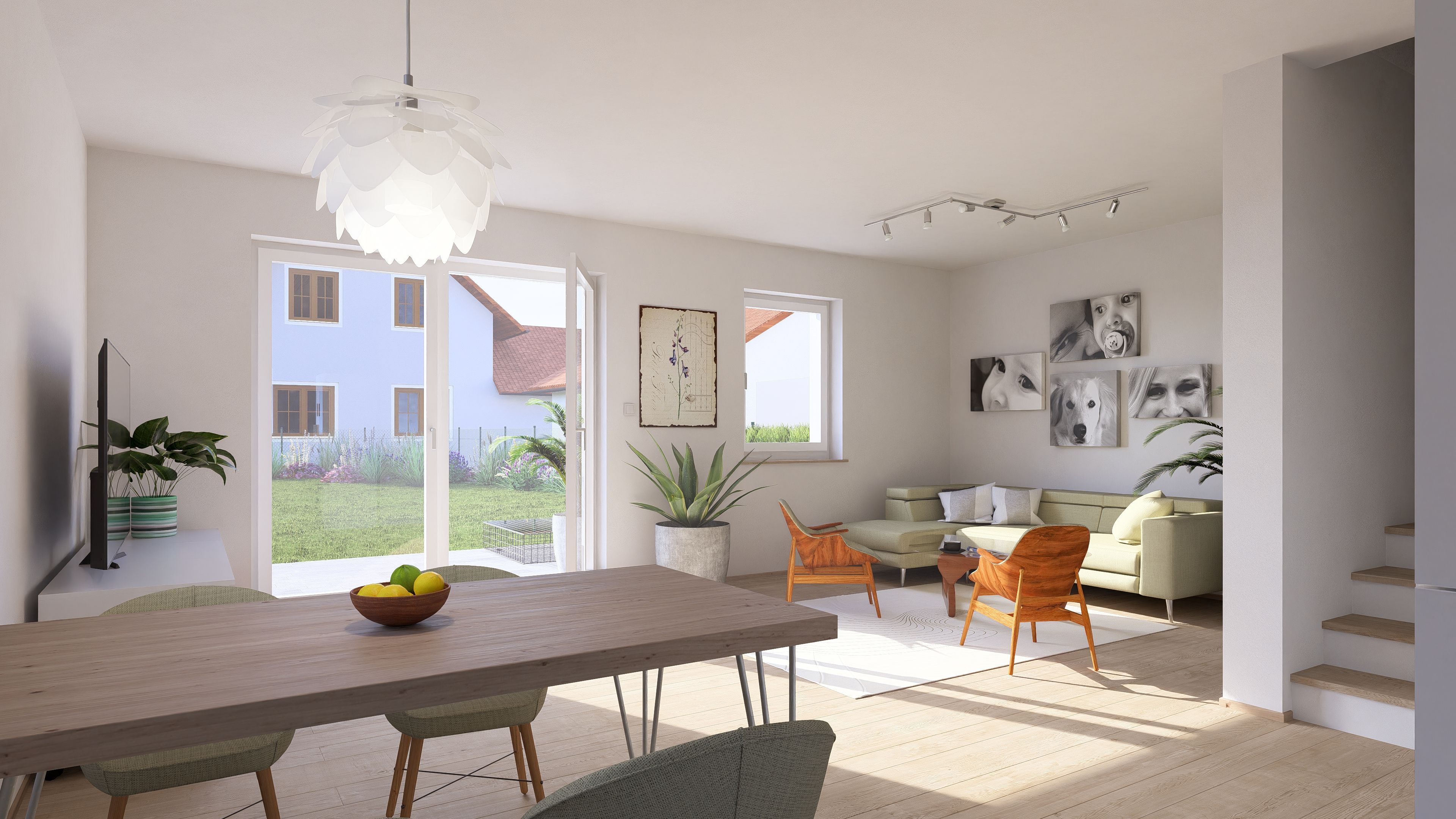 Helles Wohnzimmer mit Esstisch, grüner Couch, Holzstühlen und großen Fenstern zum Garten.