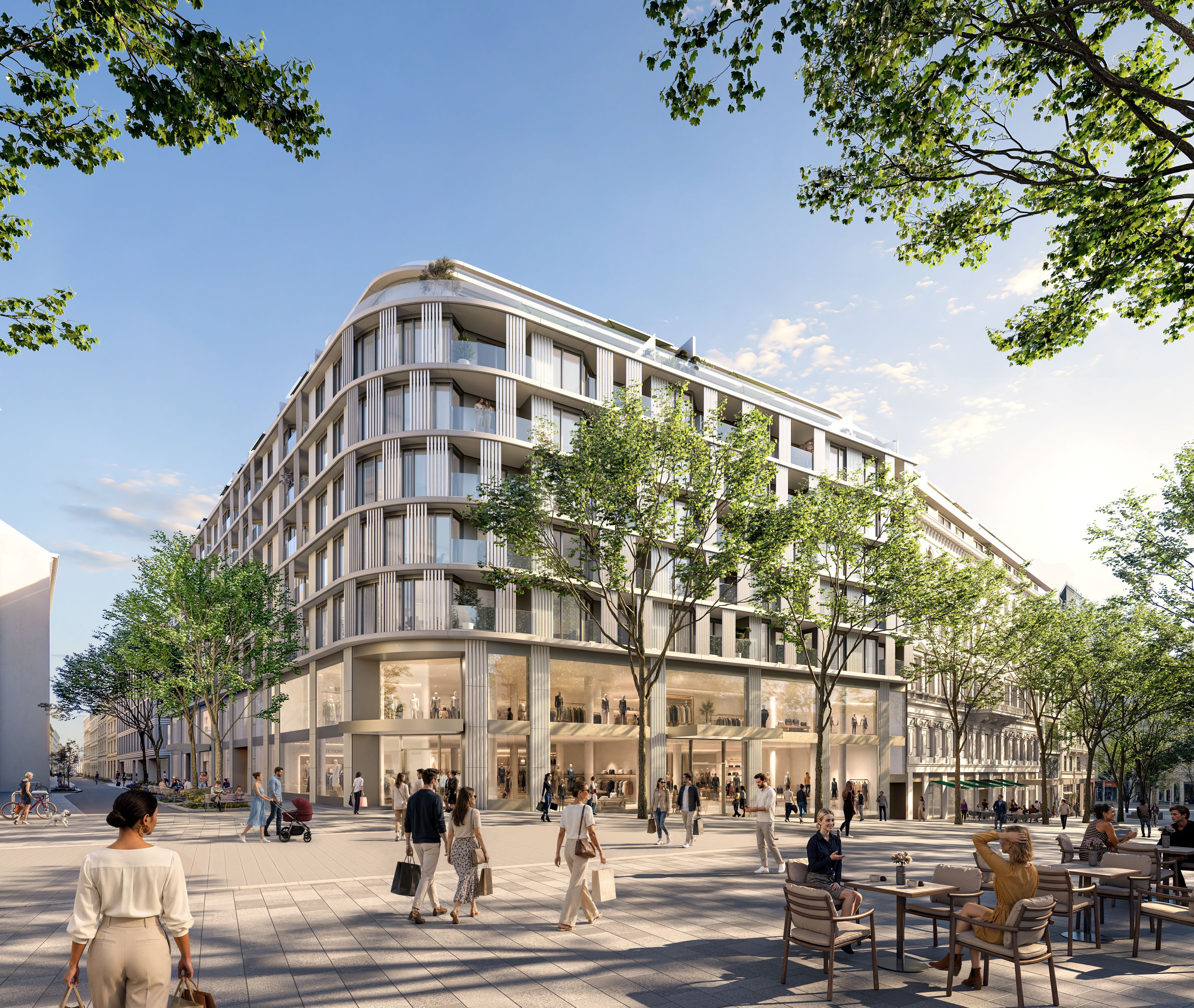 Modernes Eckgebäude mit Glasfassade, Bäumen und Menschen auf einer belebten Stadtstraße.