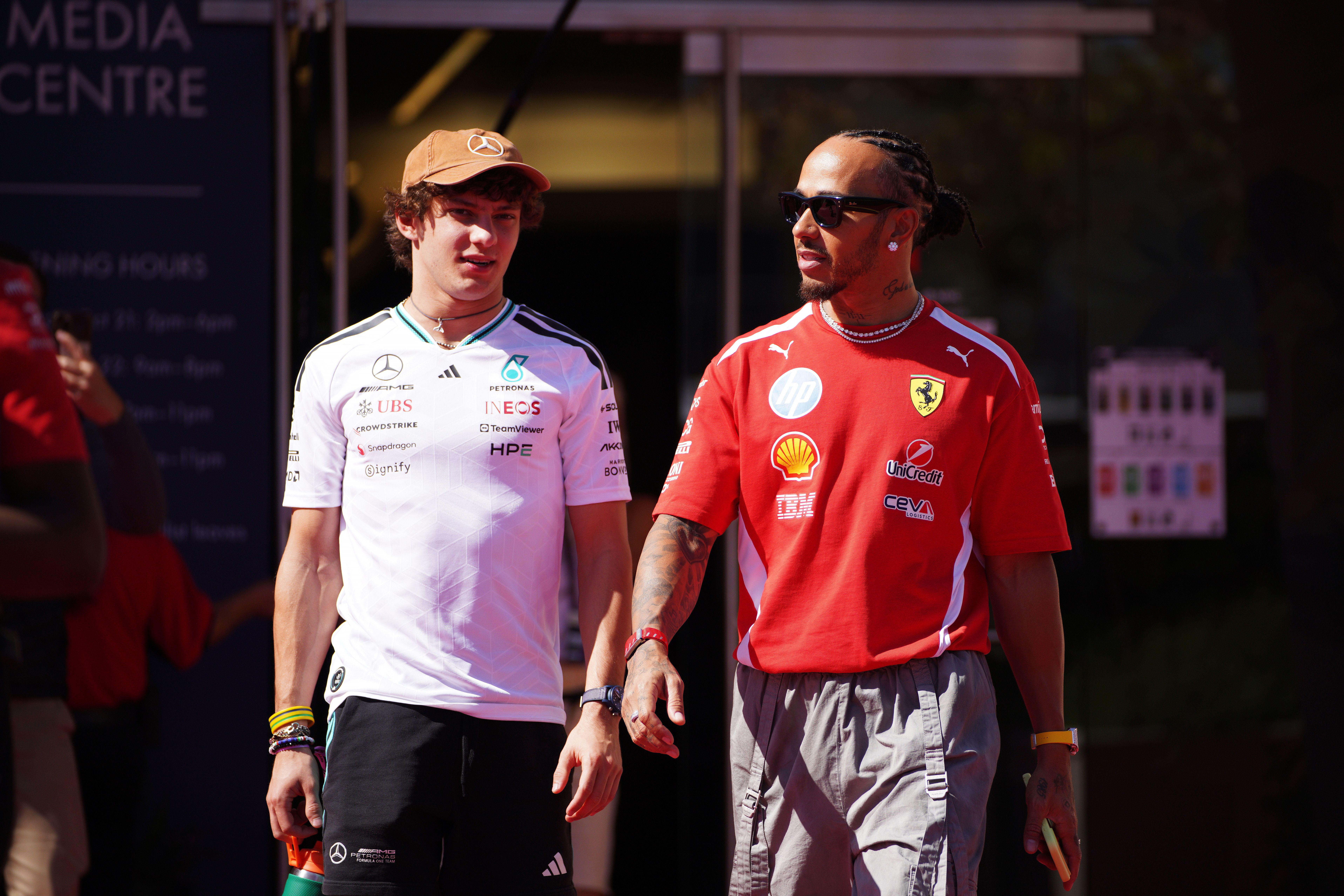 epa13323754 Mercedes driver Andrea Kimi Antonelli (L) of Italy and Scuderia Ferrari driver Lewis Hamilton of Britain enter the paddock during Media Day for the Formula One United States Grand Prix, in Austin, Texas, USA, 22 October 2026. The 2026 Formula 1 United States Grand Prix is held at the Circuit of the Americas on 25 October. EPA/DUSTIN SAFRANEK