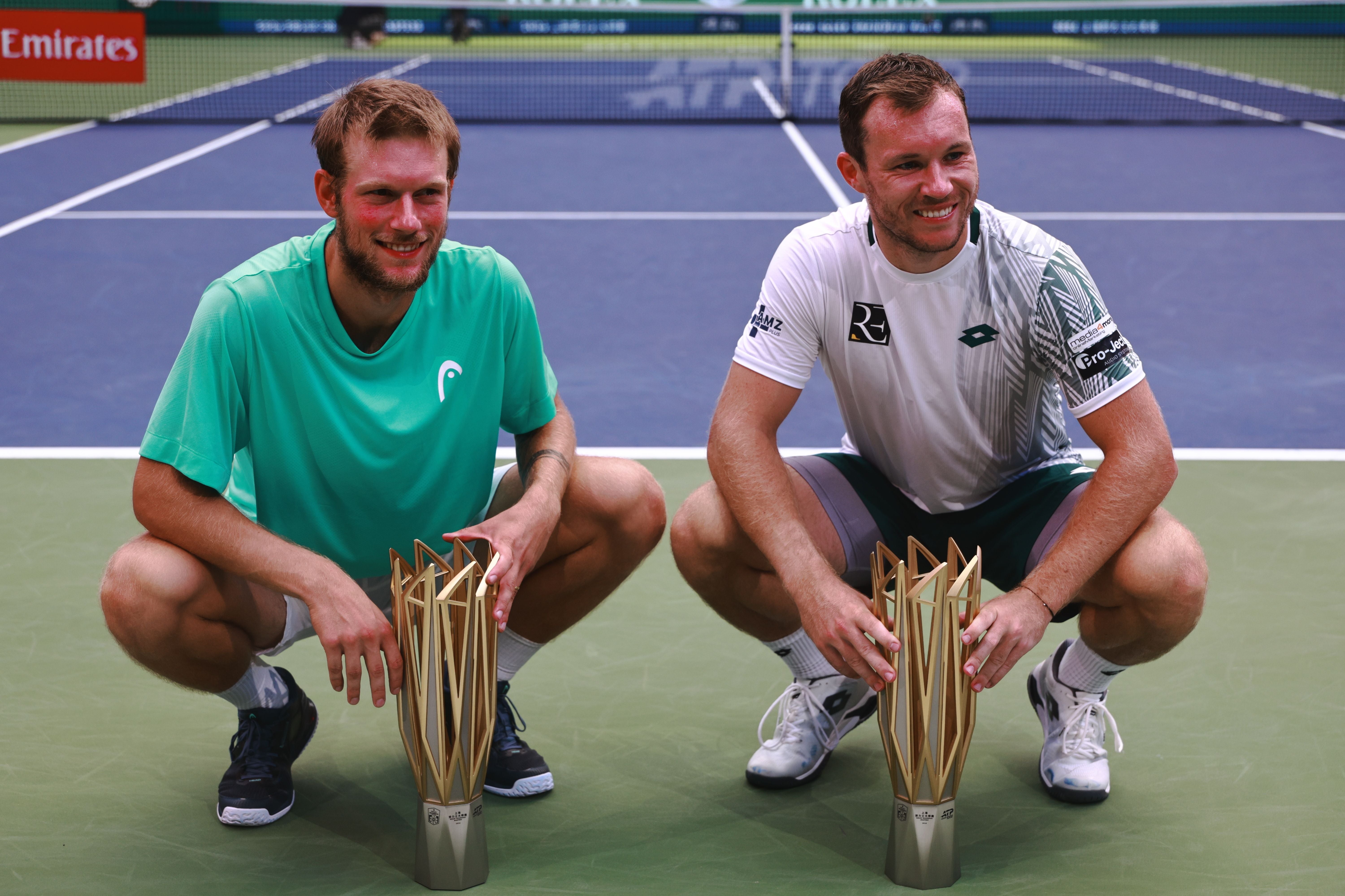 epa13313049 Lucas Miedler (R) of Austria and Neil Oberleitner (L) of Austria pose with their trophies after winning their Men's Double final match against Francisco Cabral of Portugal and JJ Tracy of USA at the Shanghai Masters tennis tournament in Shanghai, China, 18 October 2026. EPA/ALEX PLAVEVSKI