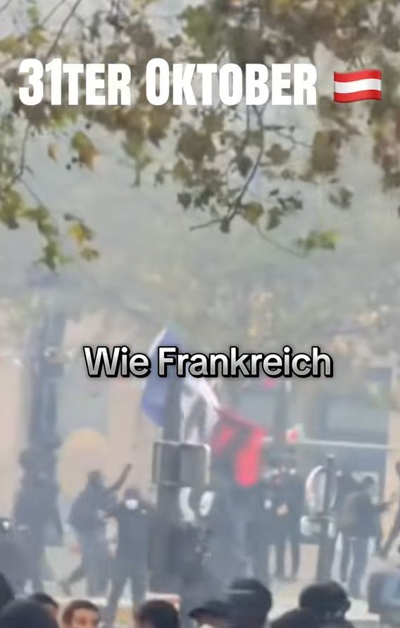 Mehrere Menschen mit Fahnen, Text "31ter Oktober" und "Wie Frankreich" im Bild.