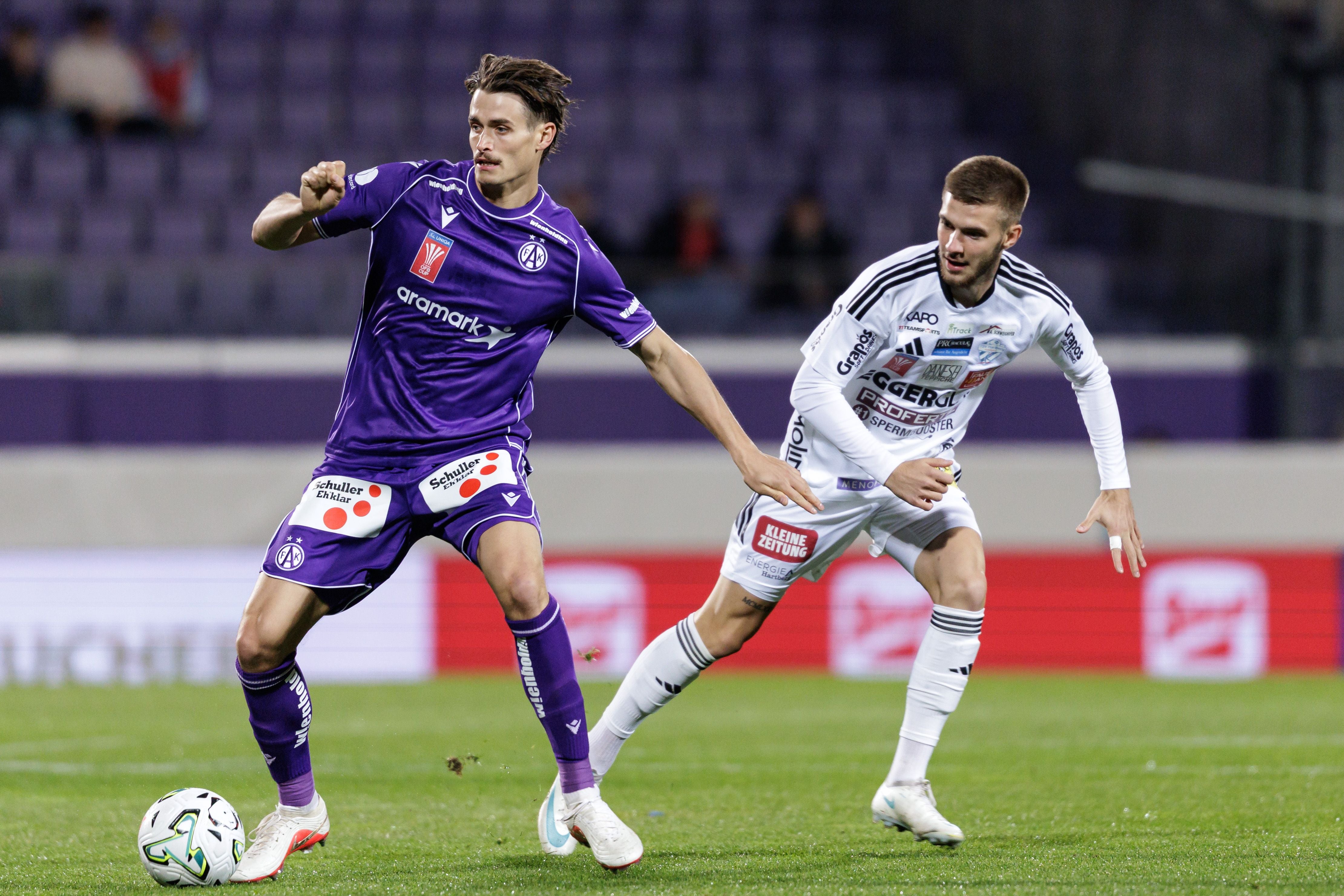 VIENNA,AUSTRIA,27.OCT.26 - SOCCER - UNIQA OEFB Cup, FK Austria Wien vs TSV Hartberg. Image shows Wilhelm Vorsager (A.Wien) and Oliver Lukic (Hartberg). Photo: GEPA pictures/ Armin Rauthner